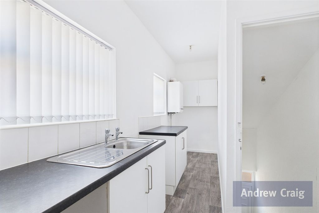 Property photo 3 of 12 Kitchen