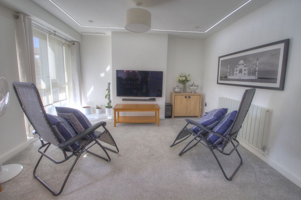 Property photo 3 of 12 Living Area