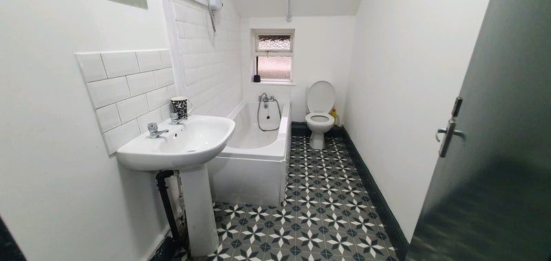 Property photo 3 of 9 A Clean And Well-Maintained Bathroom With A White ...