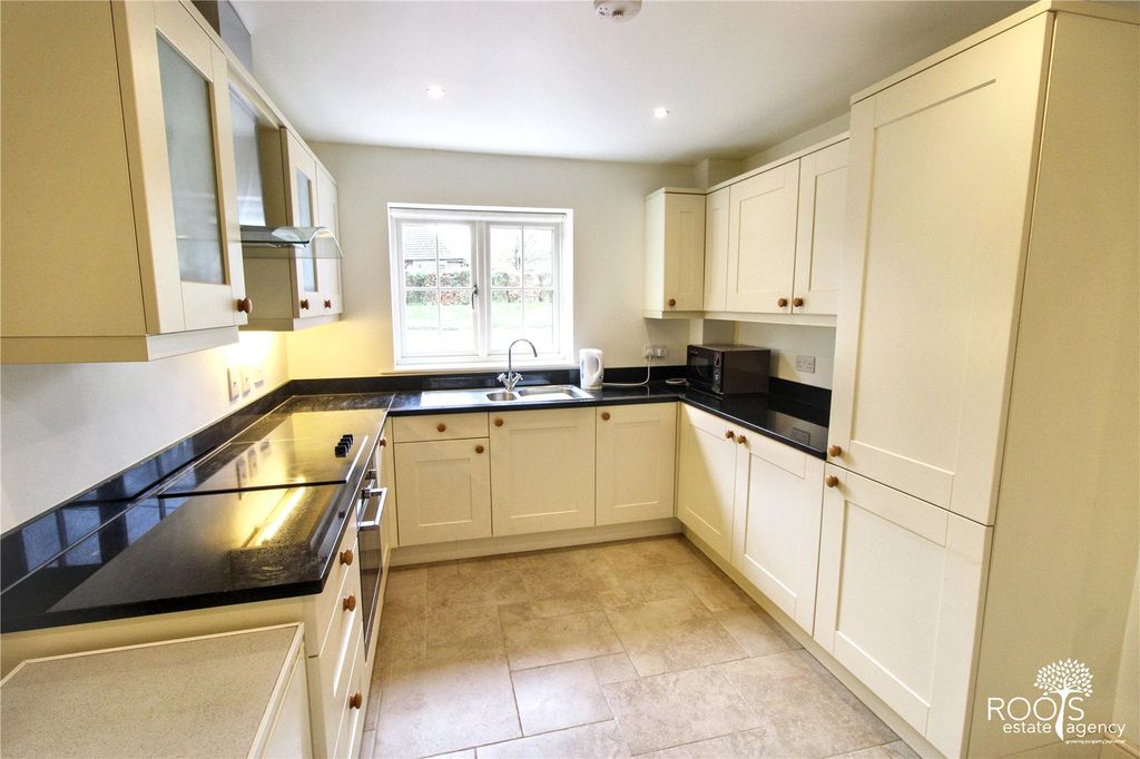 Property photo 3 of 13 Kitchen