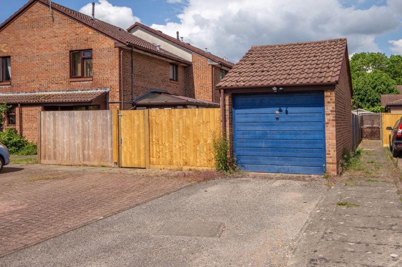 Property photo 2 of 13 Garage