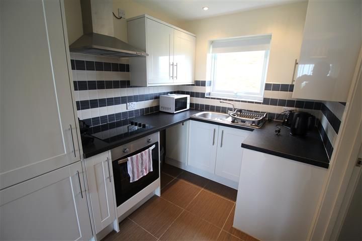 Property photo 2 of 8 Kitchen