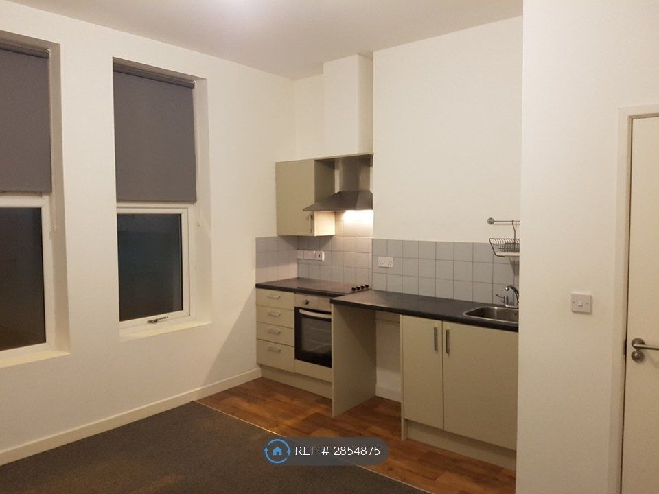 Property photo 3 of 13 Kitchen/Dining/Living