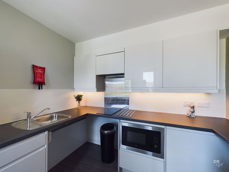 Property photo 3 of 7 Kitchen