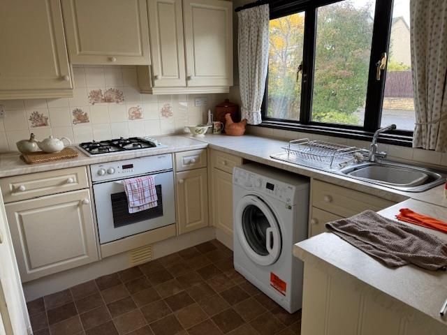Property photo 3 of 7 Kitchen