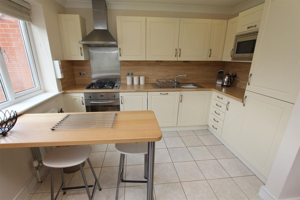 Property photo 2 of 12 Modern Kitchen With Stylish Breakfast Bar...