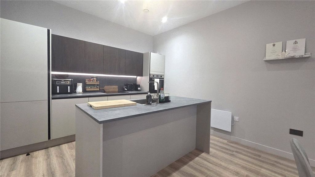 Property photo 1 of 7 Kitchen Area