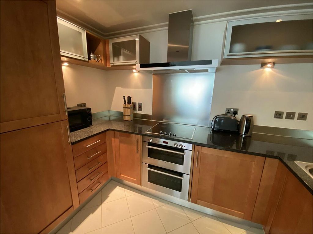 Property photo 3 of 9 Kitchen