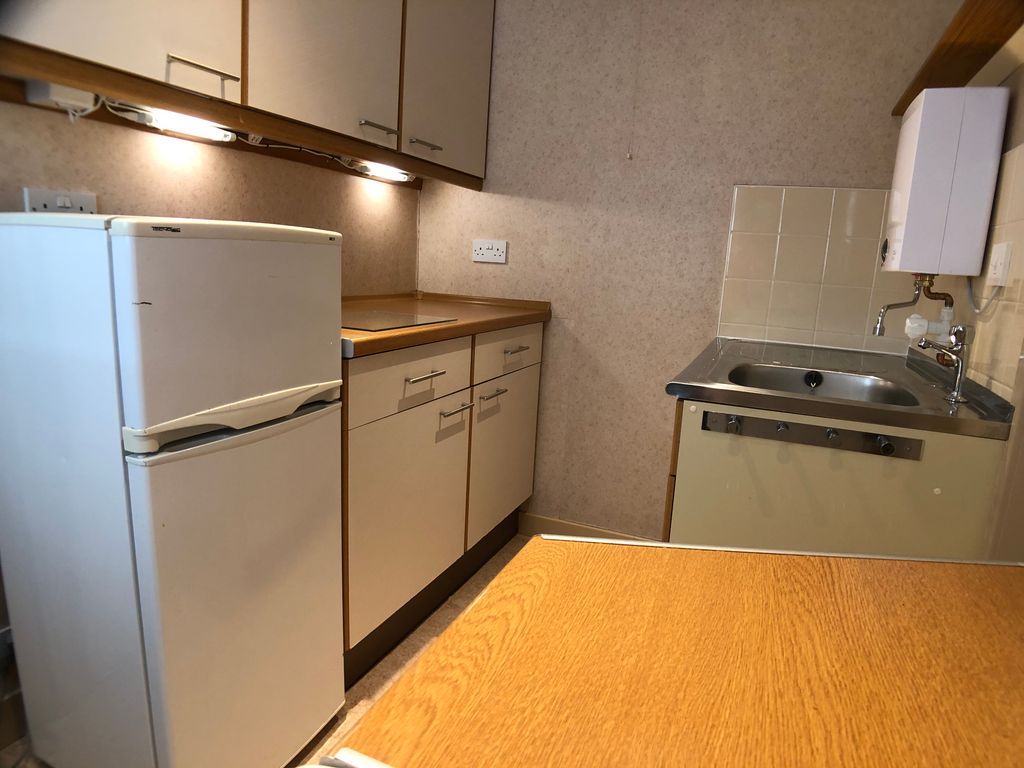 Property photo 3 of 8 Kitchen