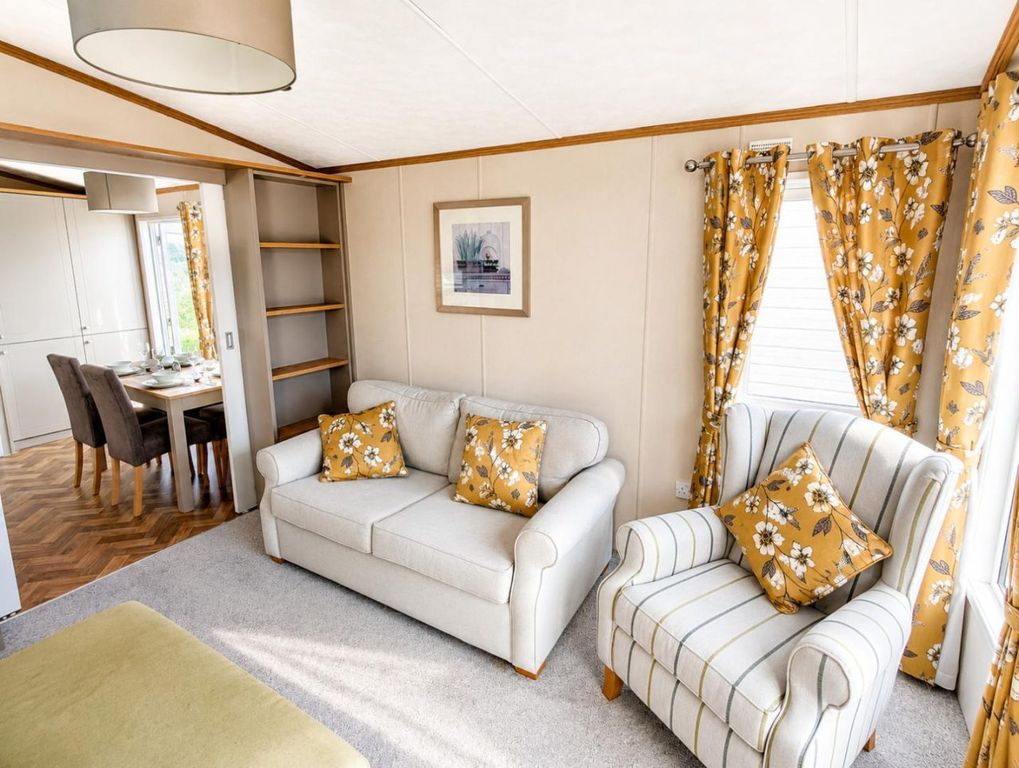 Property photo 1 of 6 Bright Pemberton Abingdon Lounge With Sofa, Armchair And Floral Furnishings