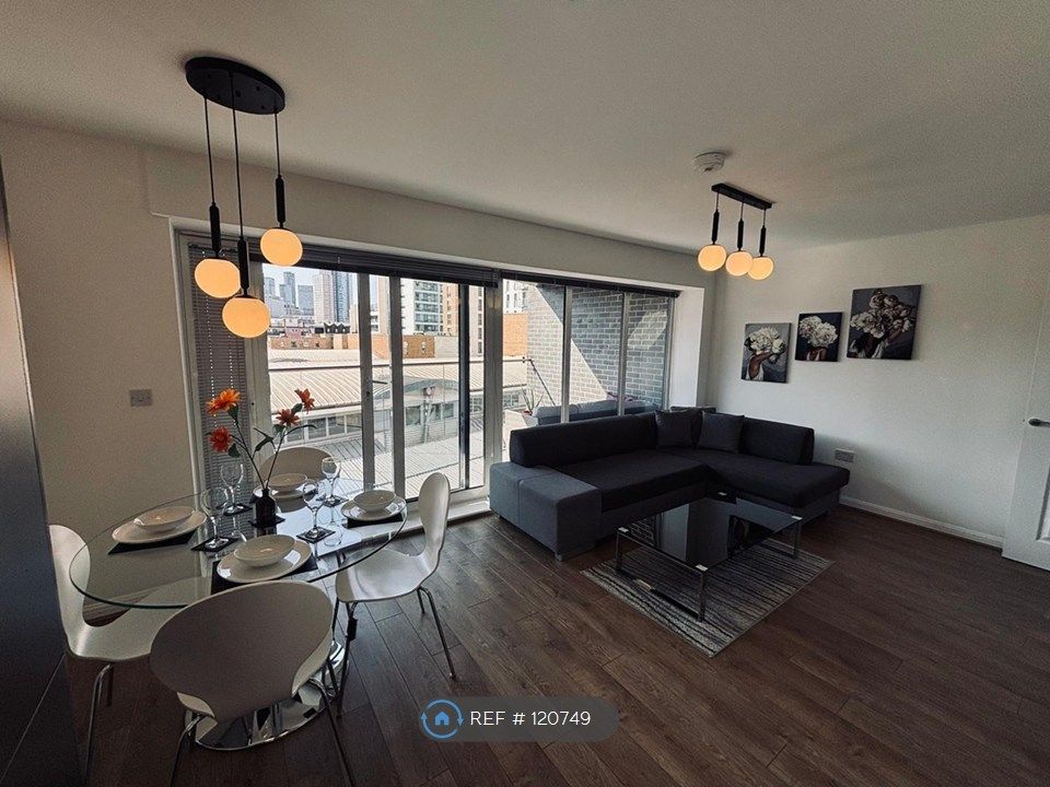 Property photo 3 of 12 Living Room And Dining Area