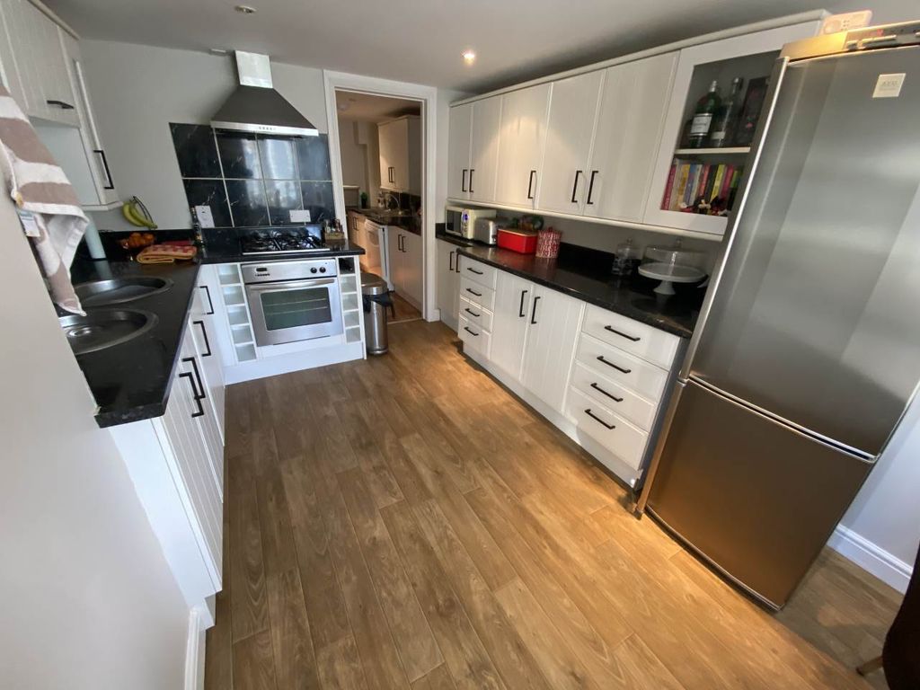 Property photo 2 of 17 Kitchen Area