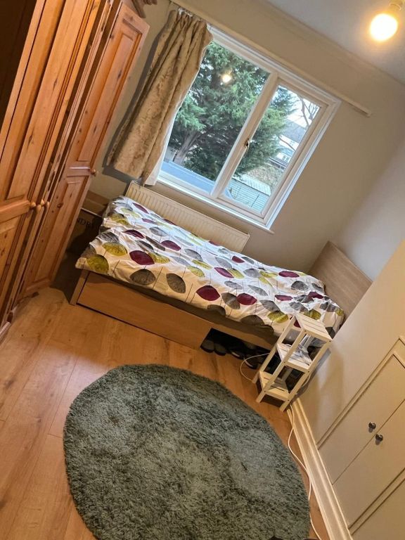 Property photo 1 of 7 Bright Bedroom With Large Window And Wood Floors...