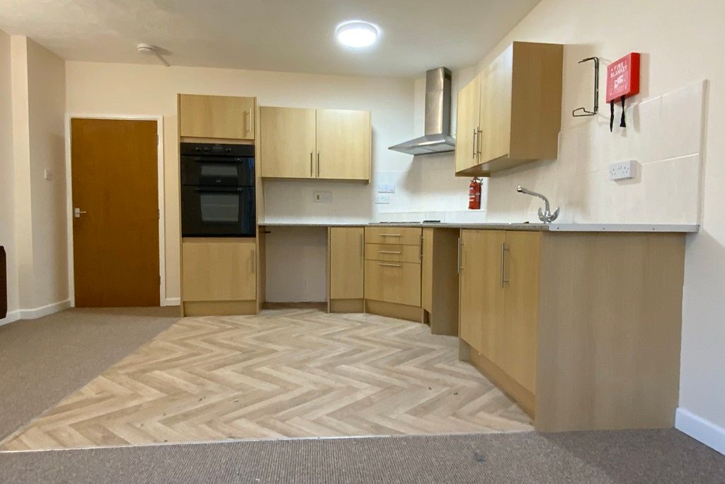 Property photo 2 of 11 Kitchen Area