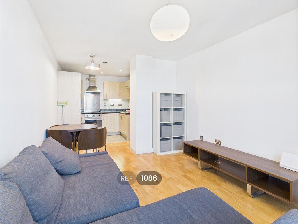 Property photo 3 of 18 Kitchen & Living Area