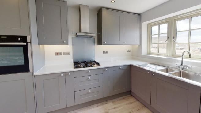 Property photo 3 of 10 Kitchen