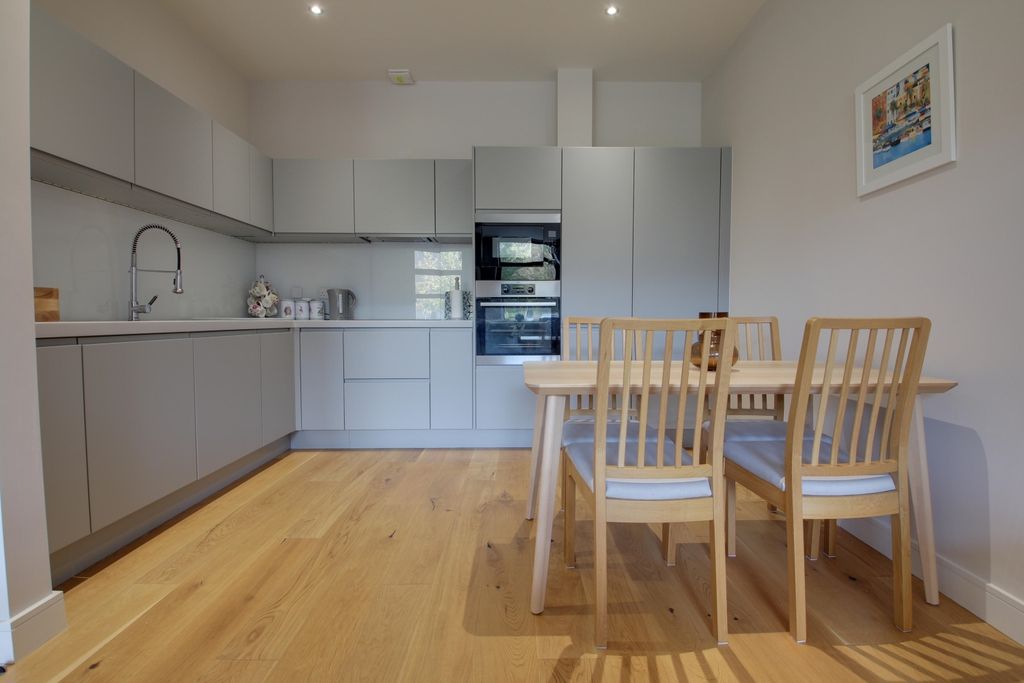 Property photo 3 of 11 Kitchen And Dining Areas