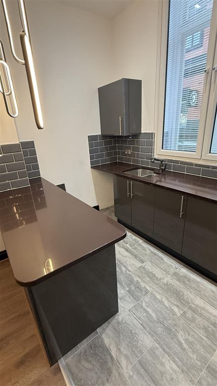 Property photo 2 of 9 Kitchen