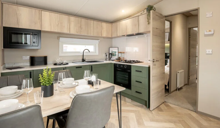 Property photo 2 of 4 Modern Dining Area And Green Fitted Kitchen In The Victory Ripley