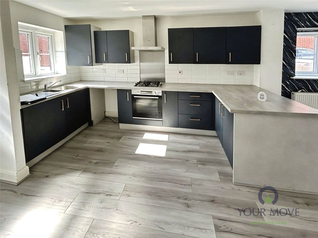 Property photo 3 of 15 Kitchen Area