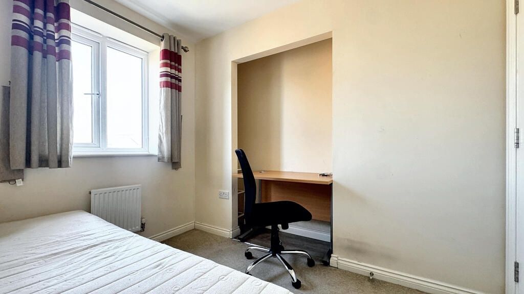 Property photo 2 of 9 A Bright Single Bedroom Featuring A Large Window W...
