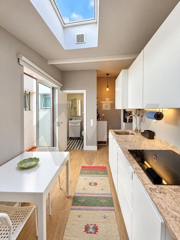 Property photo 1 of 12 Charming One-Bedroom Flat With Outdoor Space In Lisbon's Historic Centre