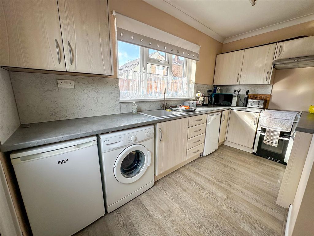Property photo 3 of 13 Kitchen Area View