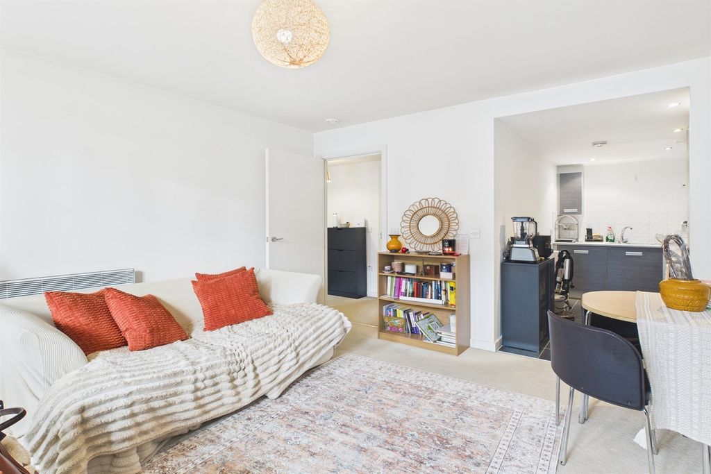 Property photo 2 of 13 Living Area