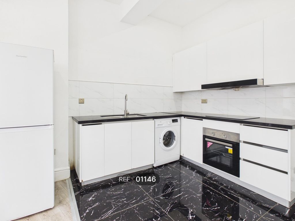 Property photo 1 of 19 Kitchen &amp; Living Area