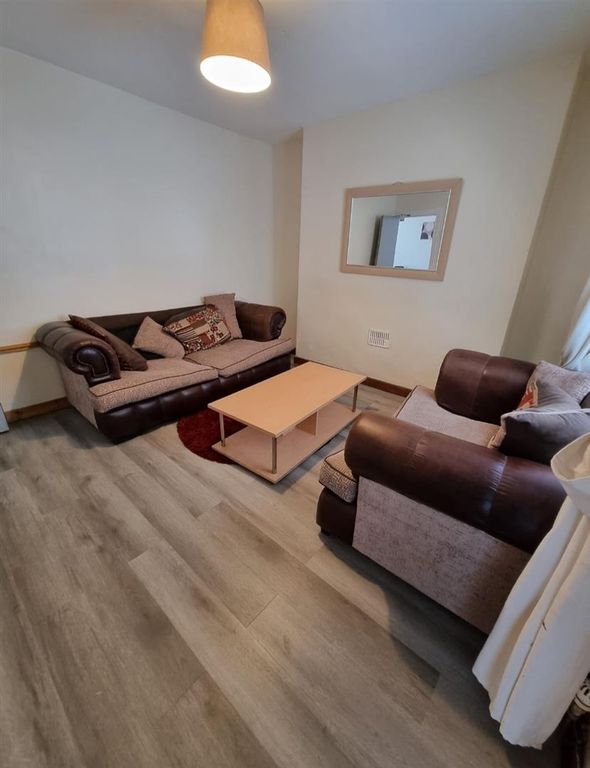 Property photo 2 of 7 Cosy Lounge With Sleek Wood-Effect Flooring...