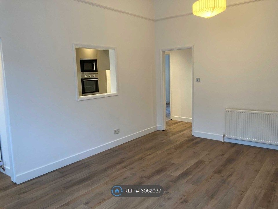 Property photo 3 of 16 Living Room (Opening To Kitchen)