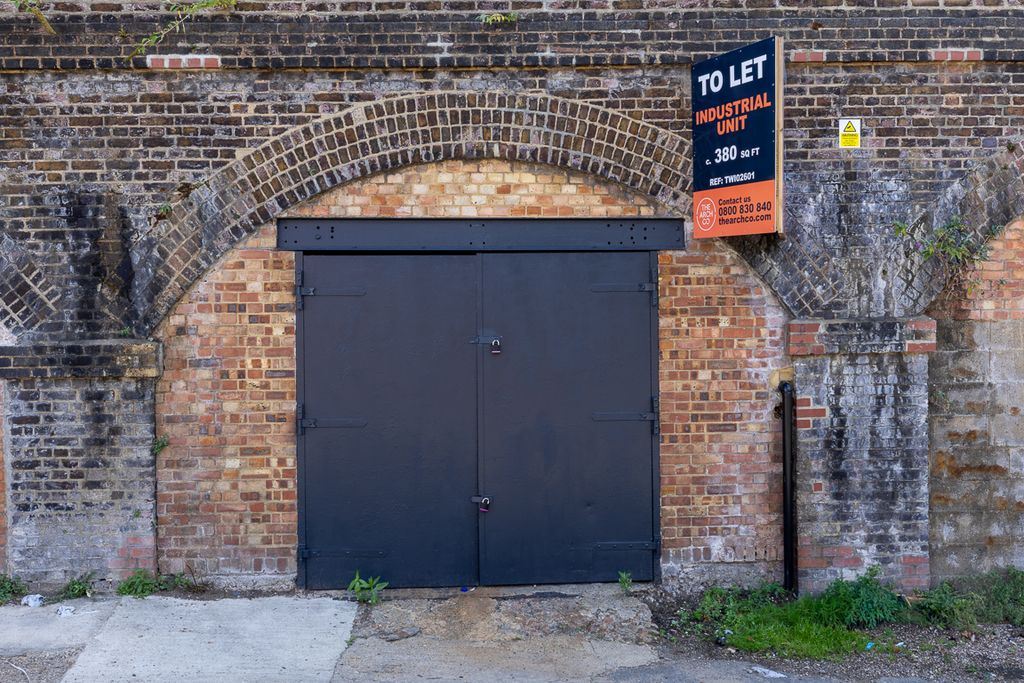 Property photo 1 of 3 The Front Of An Arch With A Closed Metal Concertina Door That Can Be Pulled Back Fully.