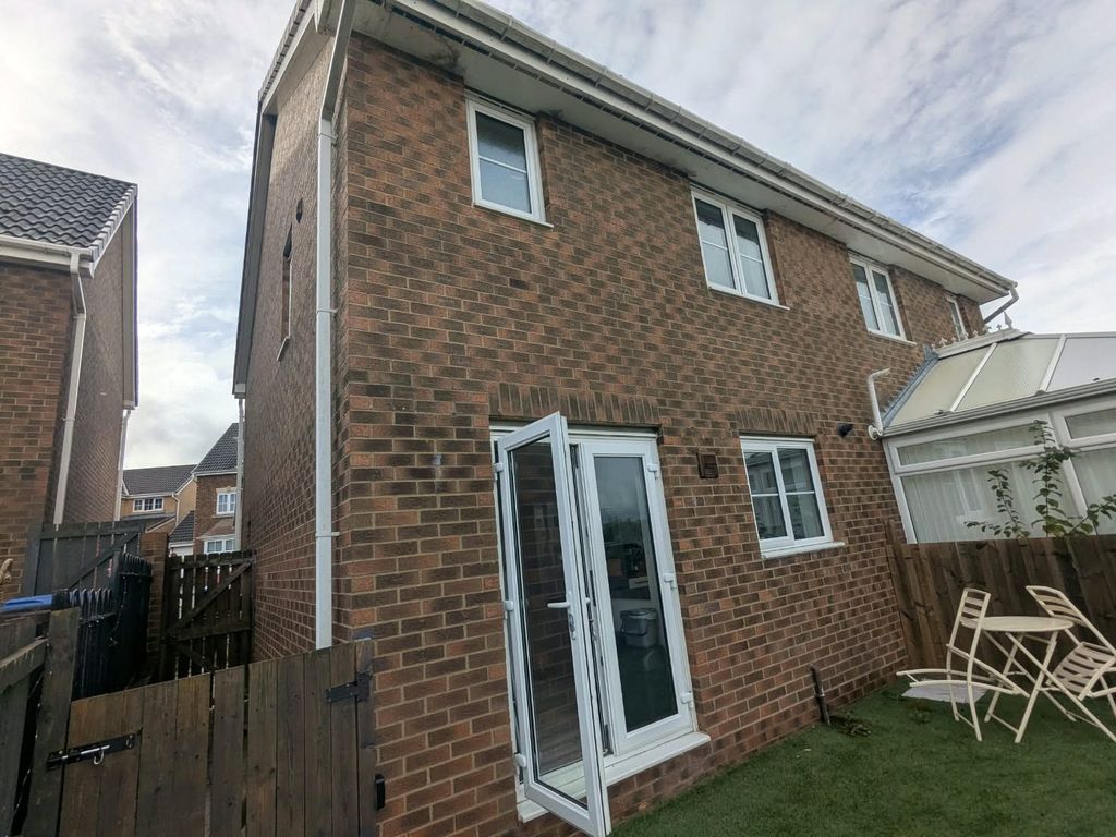 Property photo 3 of 12 Back Elevation