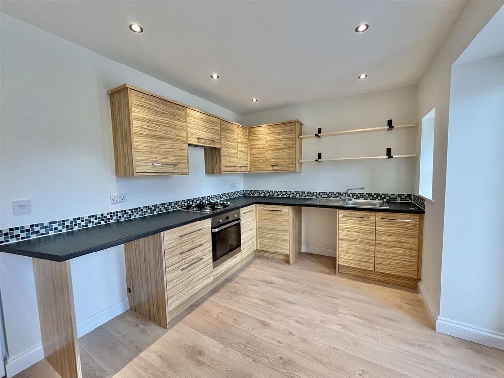 Property photo 3 of 13 Dining Kitchen
