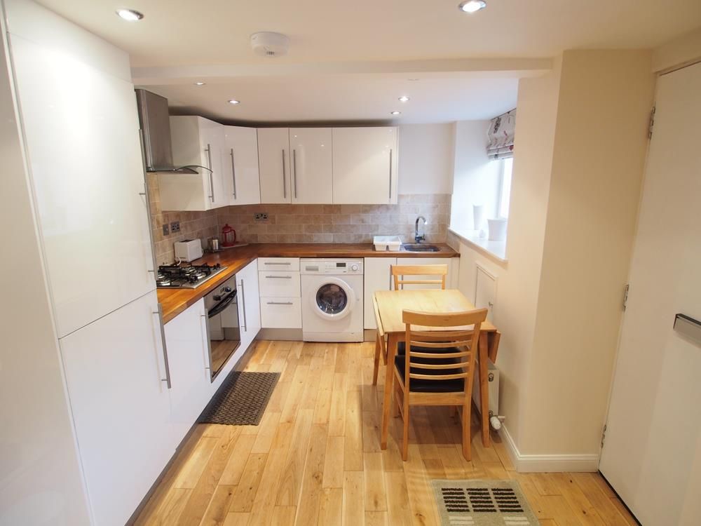 Property photo 3 of 8 Kitchen