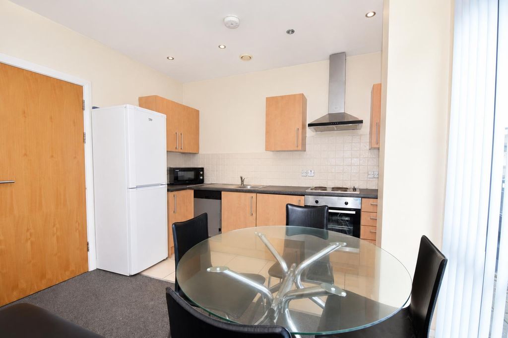 Property photo 3 of 15 Dining Open To Kitchen Area.Png