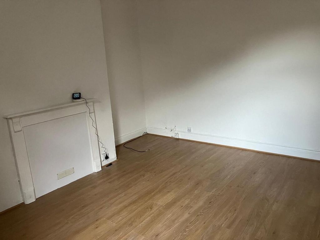 Property photo 3 of 8 Living Room