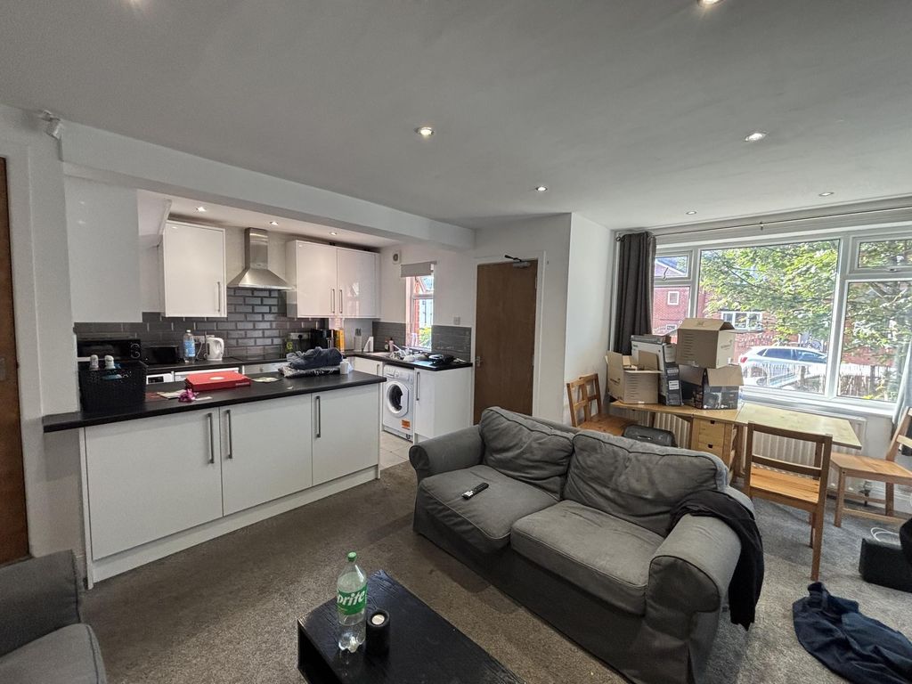 Property photo 2 of 23 Bright And Spacious Living Room With Modern Decor,...