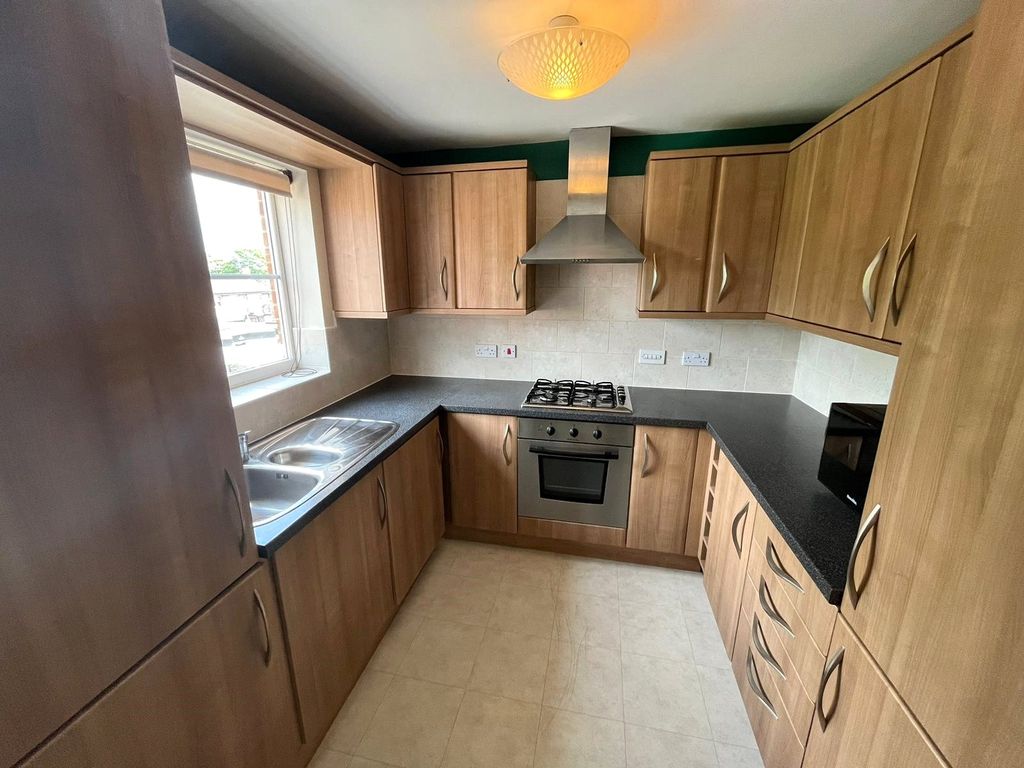 Property photo 3 of 7 Kitchen