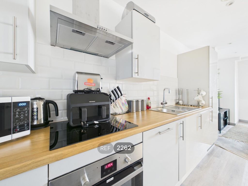 Property photo 2 of 14 Kitchen / Living Area