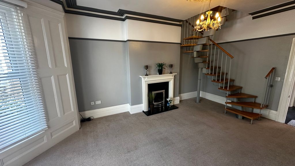 Property photo 3 of 7 Living Room 2