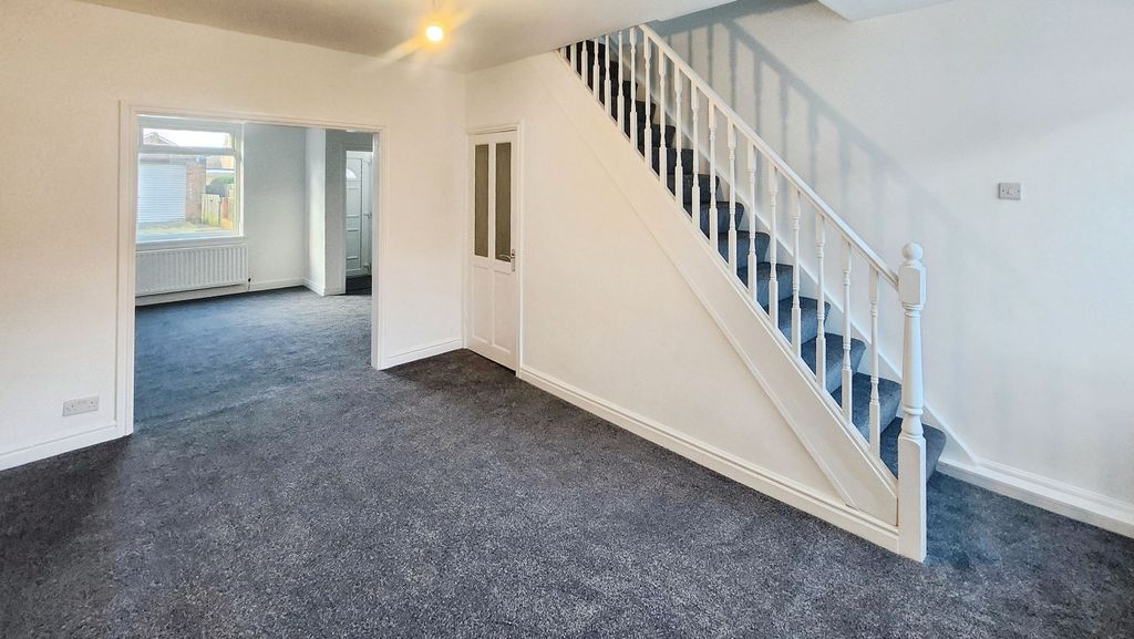 Property photo 2 of 13 Living Area