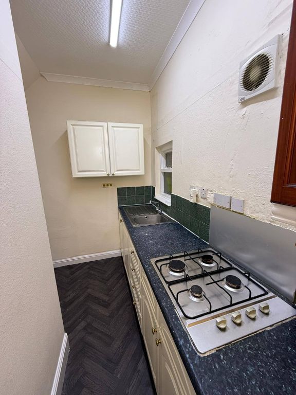 Property photo 3 of 13 Kitchen