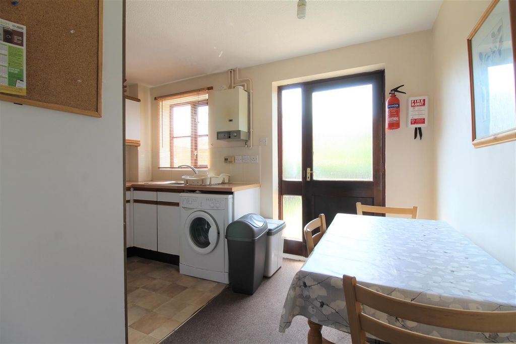 Property photo 3 of 8 3 Kitchen And Dining Area.Jpg