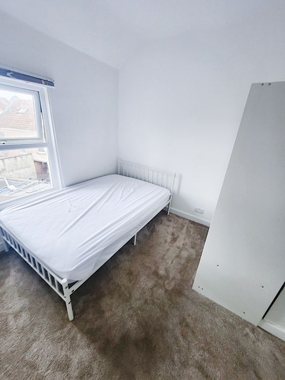 Property photo 3 of 8 Bright, Freshly Painted Bedroom With A White Metal...