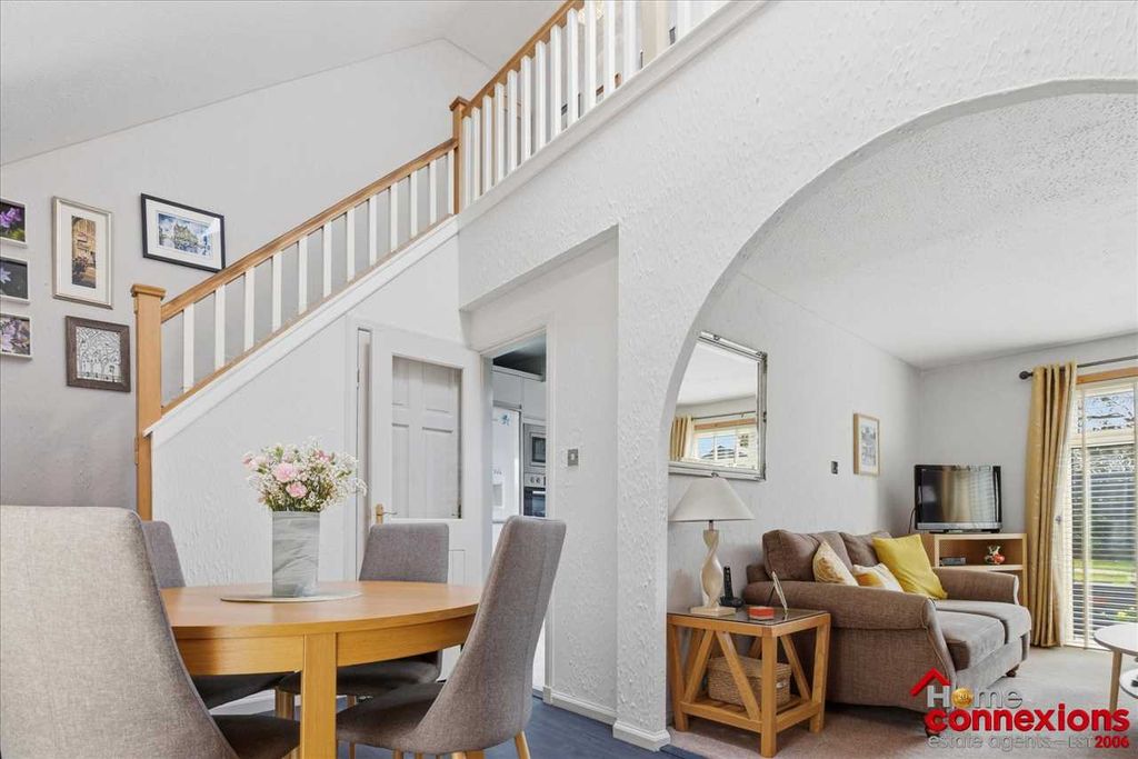 Property photo 2 of 25 Dining Area &amp; Staircase To Upper Landing