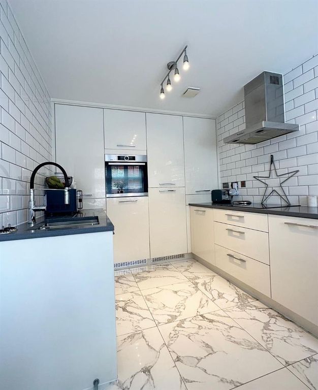 Property photo 3 of 12 Kitchen.Jpg