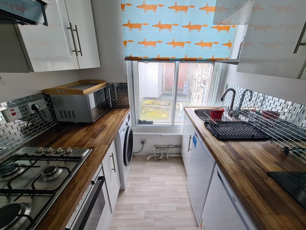 Property photo 3 of 7 Kitchen