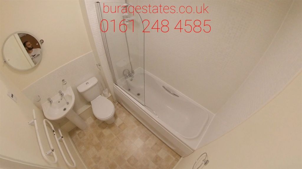 Property photo 3 of 9 Bright, Well-Maintained Bathroom Featuring A Bath ...