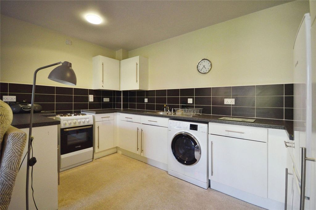 Property photo 2 of 11 Kitchen Area